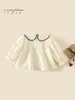 Camisa de Muñeca de Algodón Puro para Niñas Otoño 2026 Primavera y Otoño Nueva Moda Estilo Coreano Camisa Superior Clase A para Bebés Niñas 3