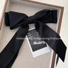 Primavera y Verano Blanco Leche Rosa Lazo Grande Cinta Pinza de Resorte Dulce y Versátil Pinza para el Cabello de Niña Accesorios para el Cabello 2025