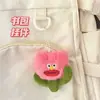 Muñeco de peluche con forma de flor de boca grande de dibujos animados, colgante de muñeco feo, regalo para estudiante, colgante para mochila, venta al por mayor