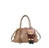 Nova bolsa de mensageiro vintage Maillard, bolsa de mão, bolsa versátil da moda com fecho de trava, bolsa de ombro com pingente, bolsa feminina da moda