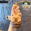 Chaveiro Pingente Figurine Panda Criativo Brinquedo de Água Alívio de Estresse Pegadinha Pistola de Água Acessório de Boneca para Chaveiro de Bolsa