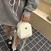 Bolsa feminina de lona estilo concha, nova para o verão de 2026, bolsa transversal casual para ombro, bolsa pequena de tecido Oxford, bolsa de armazenamento