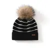 Gorro de cachemira para mujer 100% cachemira pura otoño e invierno nuevo estilo moda femenina casual suave pegajoso protección para las orejas gorro a rayas con pompón