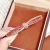 Nuevo producto transfronterizo: Pulsera de Piedra de Circonita Roja, Pulsera Trenzada de Doble Fila, Pulsera de Cruz de Mariposa, Pulsera de Mariposa de Cobre Ecológica