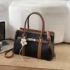 Bolso de mano de lujo ligero de nicho para comercio exterior para mujer, nuevo, estilo retro para el trabajo, para el día a día, de un solo hombro, cruzado