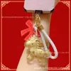 Llavero Dorado con Oro Puro, Simbolizando Riqueza Instantánea, Colgante para Teléfono, Colgante para Bolso con Certificado, Venta al por Mayor de Accesorios