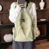 2025 Novo Estilo Coreano Casual Bolsa de Tecido de Grande Capacidade Cor Sólida Simples Leve Mochila para Alunos do Ensino Fundamental e Médio Mochila de Viagem