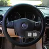 Cubierta de volante de coche DF plana perforada transpirable al por mayor, dropshipping transfronterizo, cubierta de mango de cuero premium simple para las cuatro estaciones