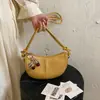 Bolsa de ombro transversal estilo coreano de luxo leve para mulheres, nova bolsa versátil tipo bolinho popular para o início do outono de 2026