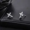 Pendientes de circonita en forma de cruz transfronterizos para hombre, sencillos y elegantes, con un toque de lujo y sofisticación, accesorios de moda y versátiles para mujer, adecuados para el uso diario