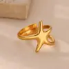 Anillo de Acero Titanio con Estrella de Mar y Caracola de Presión de Aceite para Mujer con Incrustaciones de Circonita Diseño a Juego Joyería de Playa de Verano Venta al por Mayor