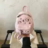 Mochila elegante y linda para mujer, estilo coreano, diseño de nicho, nuevo material de piel de cordero, versátil para ir al trabajo, estilo mini 2026, look preppy