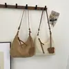 Bolsa de palha tecida nicho estilo coreano para mulheres, nova tendência primavera 2026, bolsa versátil vazada para praia e ombro/transversal