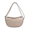 La bolsa popular de este año bolso bandolera de otoño 2023 nuevo vintage color sólido bolsa de albóndiga moda bolso de hombro bajo el brazo