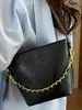 Bolso Cubo de Nicho de Alta Apariencia para Mujer, Nuevo Modelo Primavera 2026, Bolso de Mano Acolchado, Bolso de Hombro y Cruzado para el Trabajo