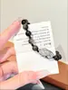 Nuevo brazalete de cristal Pixiu de obsidiana plateada y cristal de fresa estilo chino minimalista para parejas, brazalete para mujer con un toque de lujo