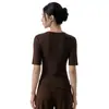 Nueva camiseta de yoga transfronteriza para mujer, corta de cuello redondo, manga de tres cuartos, top de fitness, manga corta deportiva adelgazante para Pilates