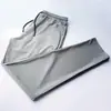 Pantalones deportivos de verano para hombre, de malla fina de seda helada, de secado rápido, elásticos, holgados, informales, transpirables, con aire acondicionado, talla grande