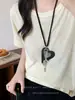 Otoño e Invierno Nuevo Clip para Gafas con Estampado de Leopardo Cadena Larga para Cuello Nicho Elegante con Estilo Accesorios de Cadena para Suéter de Gama Alta
