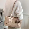 Bolso de Hombro de Lunares Ruien para Mujer Otoño 2026 Nuevo Bolso de Axila Moda de Nicho Bolso de Mano Estilo Dulce Simple