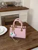 Bolsa de Palha Tecida para Mulheres 2026 Nova Coleção Primavera e Verão Moda de Nicho Bolsa de Ombro Único Transversal Bolsa Bonita da Moda para Meninas