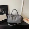 Bolsa de ombro popular de comércio exterior transfronteiriço, simples e casual, adequada para mulheres de meia-idade e mães, grande capacidade, pode ser usada como bolsa de ombro, bolsa transversal ou bolsa de mão