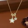 Corrente Elegante para Clavícula Banhada a Ouro Real com Zircônia Micro-Incustada para Mulheres, Colar Estrela de Cinco Pontas em Concha Natural de Design de Nicho Atacado