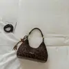 Bolsa de ombro casual, de alta qualidade, estilo coreano, uma bolsa de ombro nichada e estilosa para o dia a dia, apresentando cor sólida, design retrô e um estiloso formato crossbody.