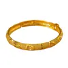 Pulsera Popular Transfronteriza Chapada en Cobre 24K Lujo Accesible Gama Alta con Hebilla Calada Tallada para Mujer Joyería de Boda Dubái Oriente Medio