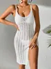 Falda de punto dividida de alta gama nueva europea y americana para vacaciones de verano con protección solar, vestido fresco hueco con tirantes finos en los hombros