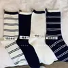 Calcetines Grues de Rayas de Media Pantorrilla Estilo Universitario Primavera/Verano para Mujer, Estilo Coreano, Versátiles, con Diseño de Moño Trasero y Diseño de Bloques de Color