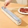 Filme plástico descartável de grau alimentício com cortador embutido, fixação magnética, para uso doméstico na geladeira e na cozinha - uma ferramenta conveniente para cortar sem rasgar
