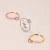 Anillo clásico de oro rosa con baño de oro, color Joker exquisito, microdiamante, cuatro garras, regalo, disponible
