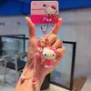 Llavero auténtico de Sanrio, estilo callejero, llavero de Hello Kitty, accesorio lindo y genial para bolsos, pequeño colgante