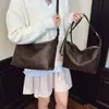 Bolso de Hombro Tipo Tote de Cuero Suave Lujo Ligero para Mujer, Nuevo Modelo 2026, Bolso Versátil de Nicho Tipo Dumpling con un Toque de Alta Gama, Adecuado para el Trabajo Diario y Uso Cruzado