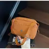 Bolsa de Ombro Versátil de Nicho Estilo Japonês, Nova Bolsa Transversal Quadrada Pequena Leve para o Dia a Dia Transfronteiriça, Bolsa Feminina Simples Portátil para Uso Externo