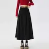 Moderna falda midi de pana retro para mujer, nuevo estilo coreano de otoño e invierno, falda de línea A que cubre la cadera