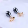 Moda Europea y Americana Clip de Oreja de Perla Joker Clip de Oreja Pequeño Gota de Agua Fresca Clavo Pendientes de Moda Femeninos Suministro Directo de Fábrica
