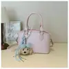 Bolso de mano para mujer 2026 nuevo modelo moda ins coreana simple de lunares bolsa cuadrada pequeña con un toque de alta gama bolso cruzado versátil