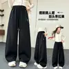 Calça de moletom infantil outono 2026 nova estilo coreano solta para crianças, calça esportiva curva da moda para primavera e outono para crianças mais velhas