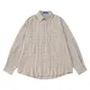 Camisa a cuadros texturizada azul de corte holgado con hombros caídos y manga larga, con bolsillo en el pecho izquierdo, transpirable, ligera, casual, con cuello para hombre