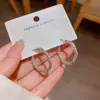 Pendientes de Aro Retorcido de Circonita para Mujer 2026 Nuevos de Moda de Gama Alta Lujo Ligero Estilo de Nicho Pendientes de Aro Simples