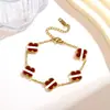 Pulseira Flor de Cinco Folhas 13mm Madrepérola Trevo de Quatro Folhas Dupla Face Estilo Ins Europeu e Americano Ouro 18K Banhado Joia de Mão Fabricante Venda Direta Atacado