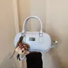 Bolso Pequeño Estilo Bolos Transfronterizo para Mujer 2026 Nuevo Versátil Texturizado Bolso Almohada para Hombro Bolso Cruzado Boston