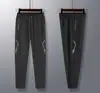 Calça Casual Confortável para Treinamento de Equipe de Atletismo 160g Poliéster Cordão Elástico Casual Esportivo Publicitário Calça de Fábrica Lote