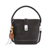 Bolso cubo estilo francés para mujer, nuevo bolso de hombro color-blocking de moda 2026, bolso de mano de nicho para el día a día, bolso pequeño cruzado para damas