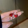 Aretes retro franceses de temperamento de socialité de moda sencilla de personalidad de cinco piezas de aguja de plata 925 con gota de aceite rojo vino