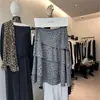 Outono/Inverno 2026! Saia feminina de camurça com estampa de leopardo, cintura alta, assimétrica, com babados em camadas tipo bolo