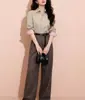 Camisa de Manga Larga Rayada de Alta Gama, Elegante y Exquisita para Mujer con Cuello de Solapa, Presentando un Estilo de Lujo Ligero y Minimalista