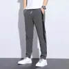 Pantalones Casuales para Hombre Verano Nuevo Elástico en Cuatro Direcciones Seda de Hielo Fina Rectos Ligeros de Negocios Empalmados Estilo Coreano Ajustados